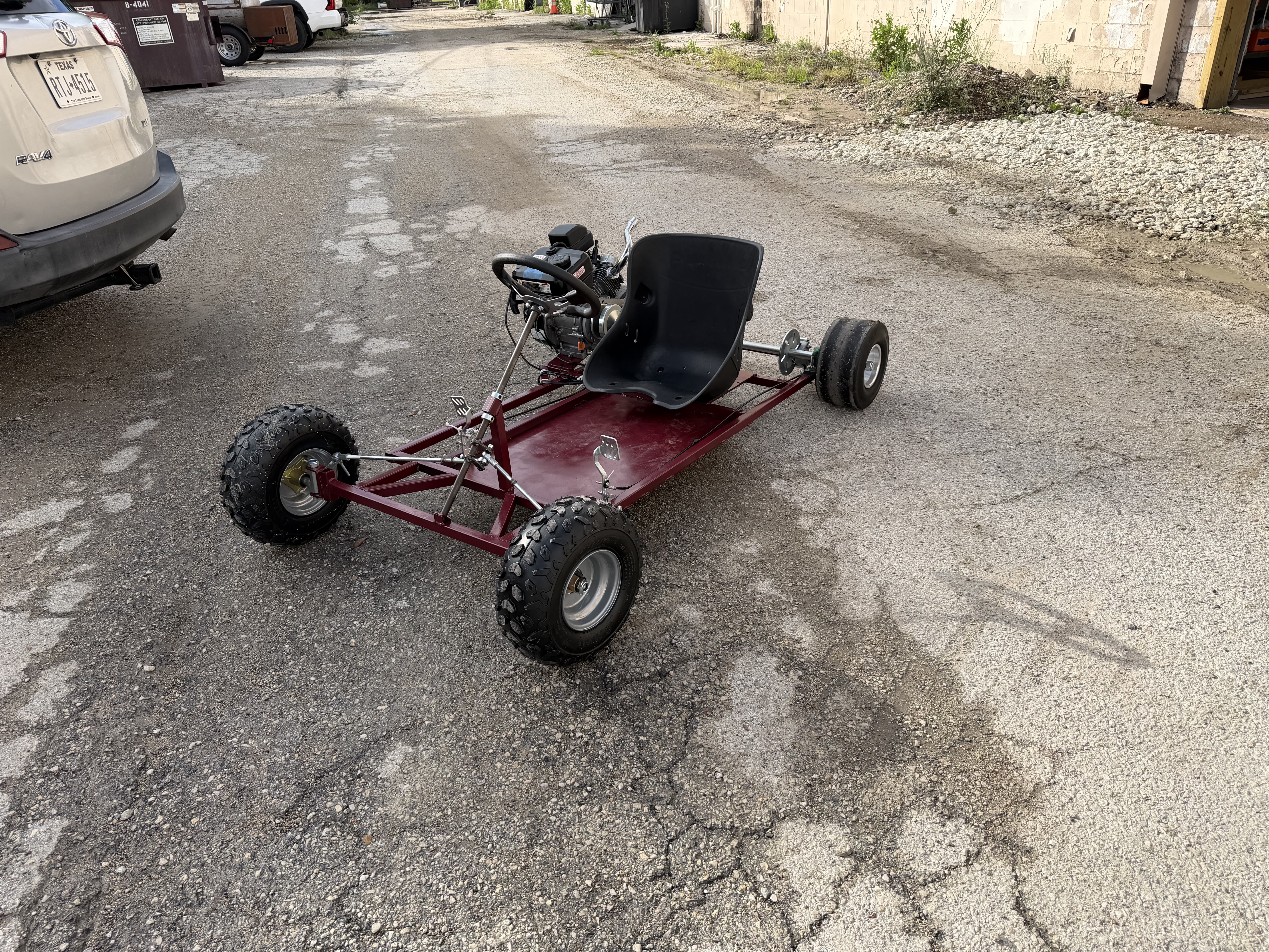 Assembled go-kart with engine and steering